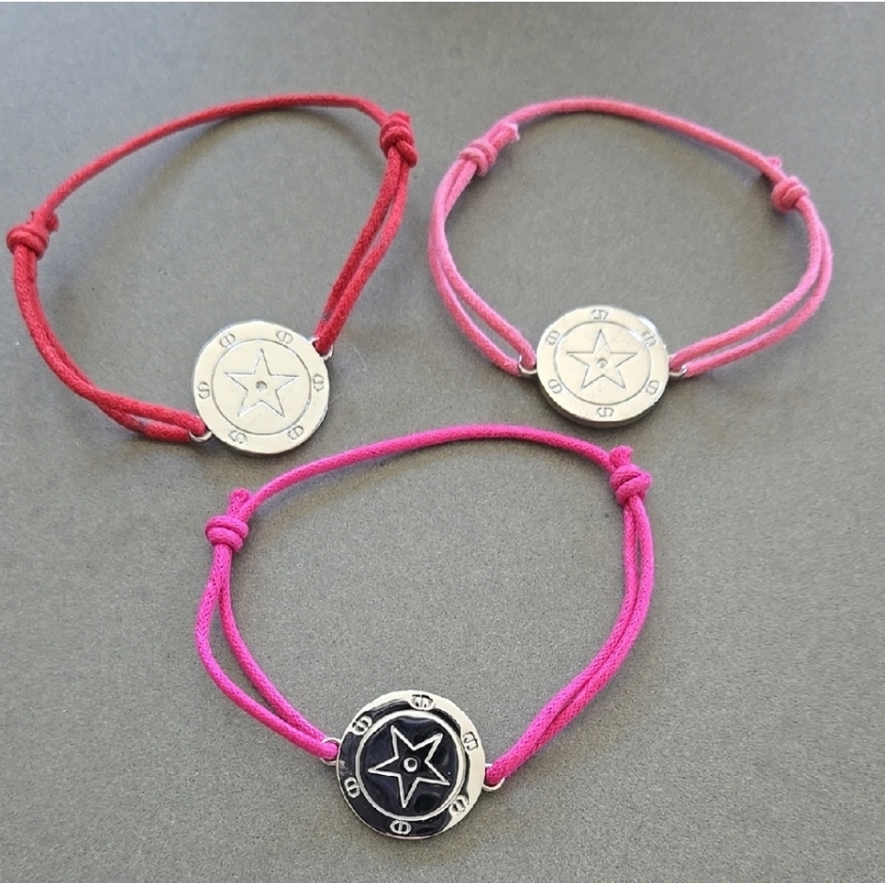 Authentic DIOR star charm bracelet available 2 different colors Red or Pink cord